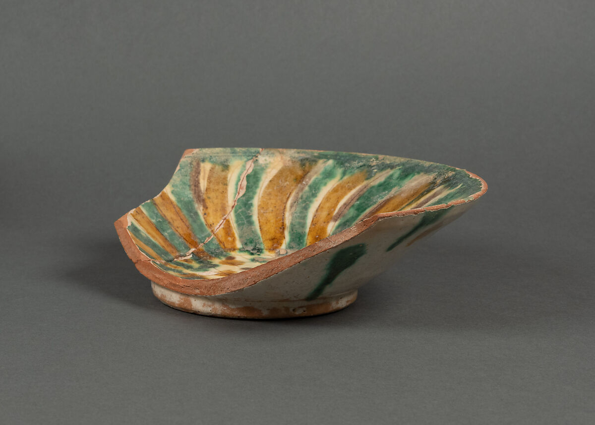 Fragment of a Bowl, Earthenware; white slip, incised and splashed with polychrome glazes under transparent glaze (sgraffito ware)