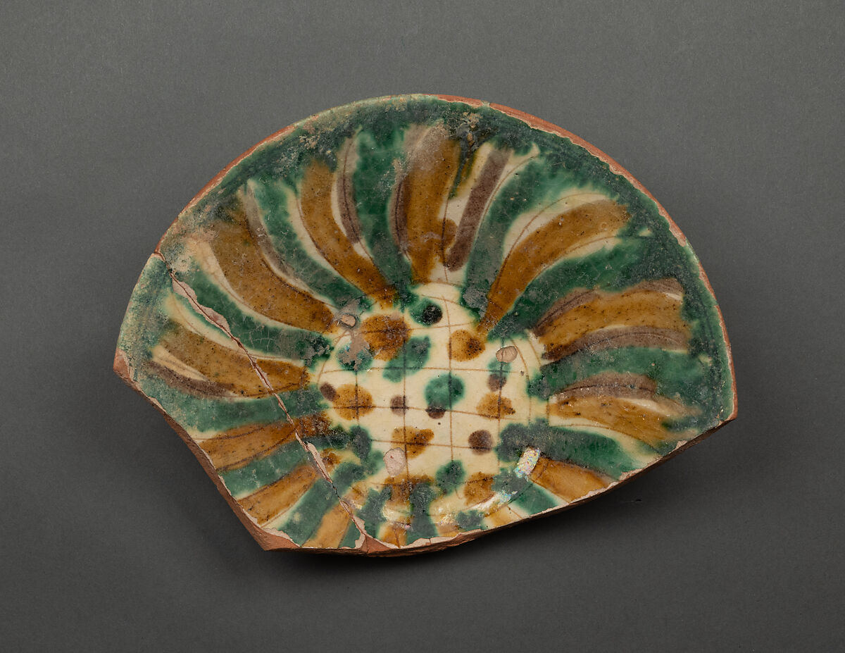 Fragment of a Bowl, Earthenware; white slip, incised and splashed with polychrome glazes under transparent glaze (sgraffito ware) 