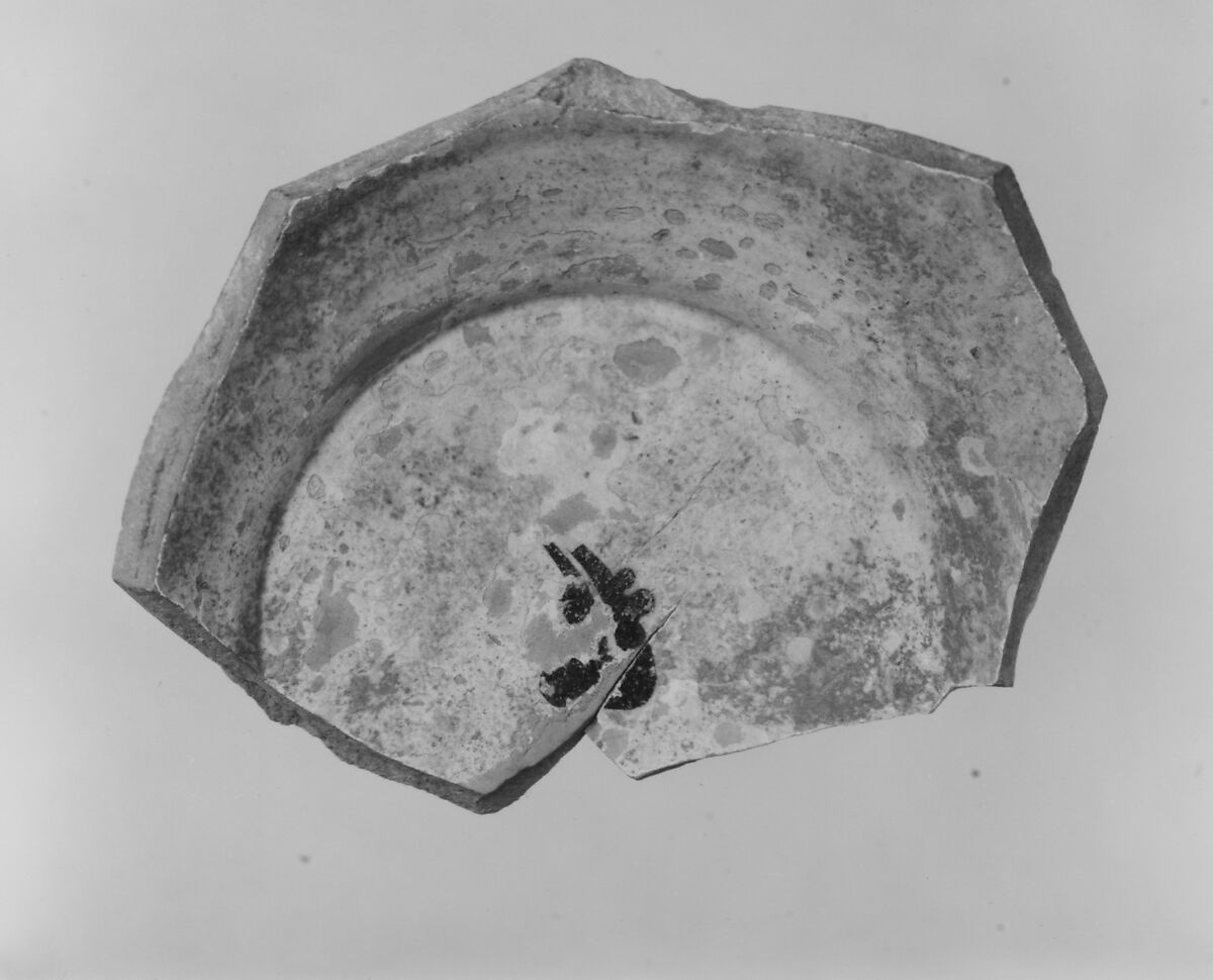 Fragment of a Bowl, Earthenware; white slip, black slip decoration, transparent glaze 
