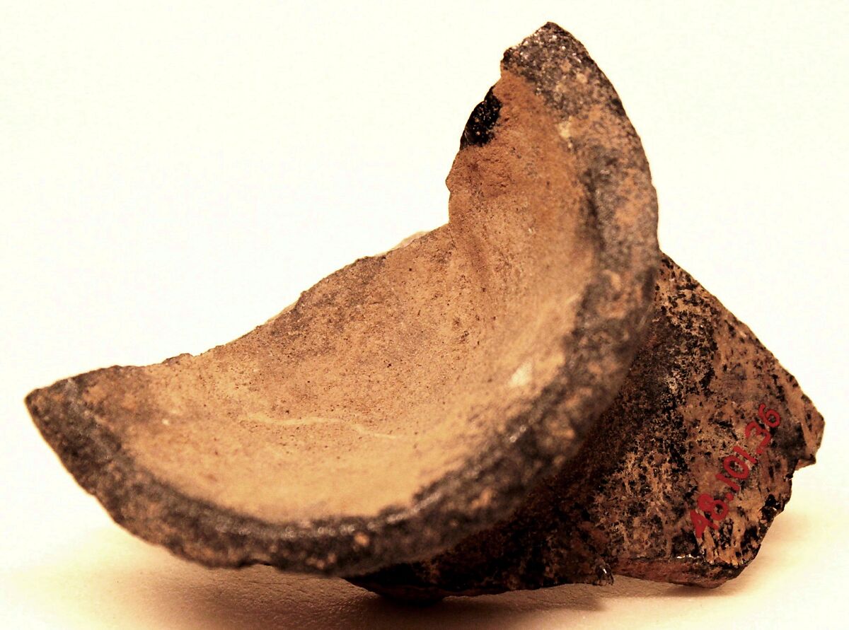 Fragment of a Misfired Vessel Base (Waster?), Stonepaste; charcoal body under olive-green and transparent glaze