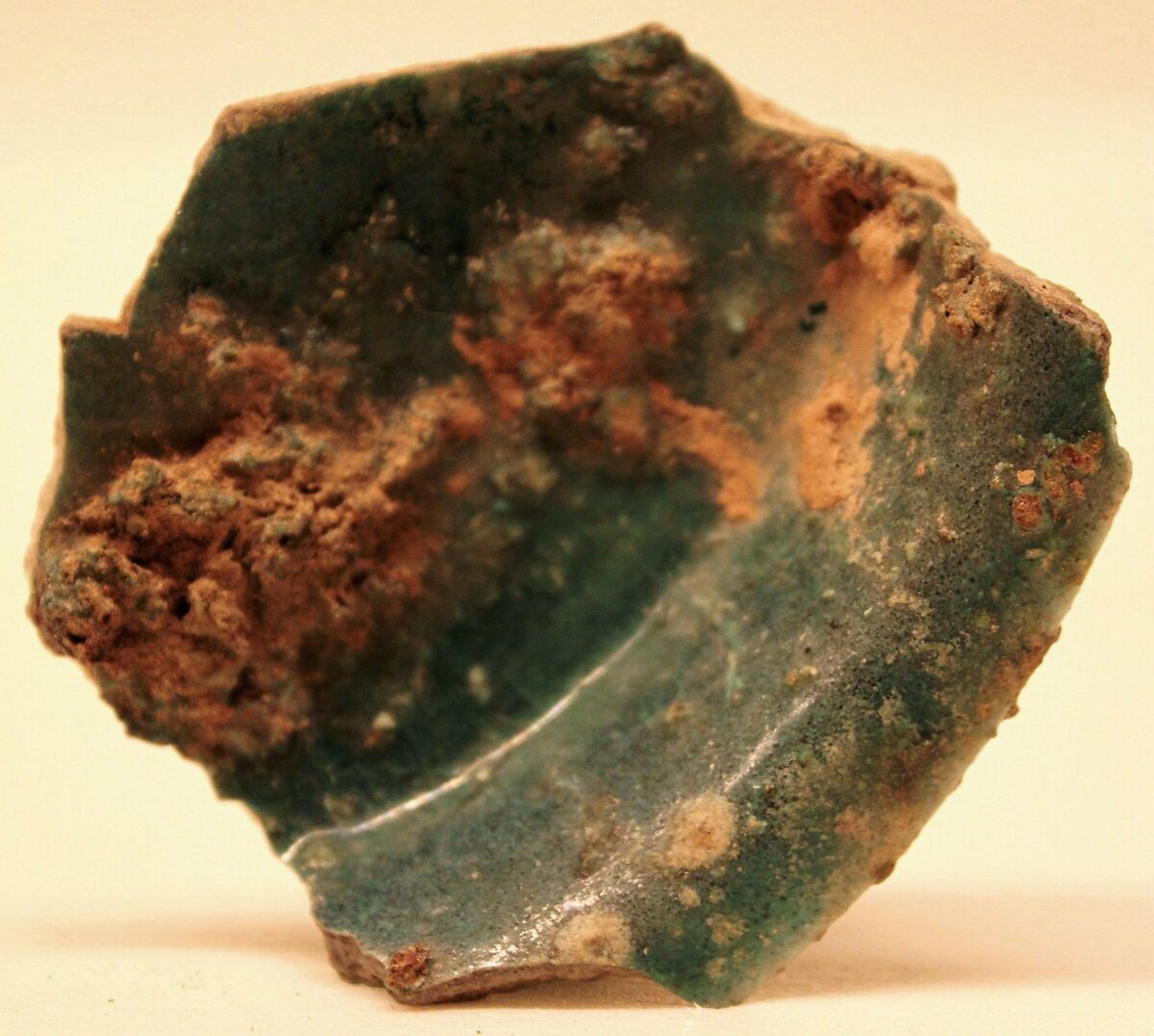 Fragment of a Waster, Stonepaste; buff body under transparent alkaline glaze