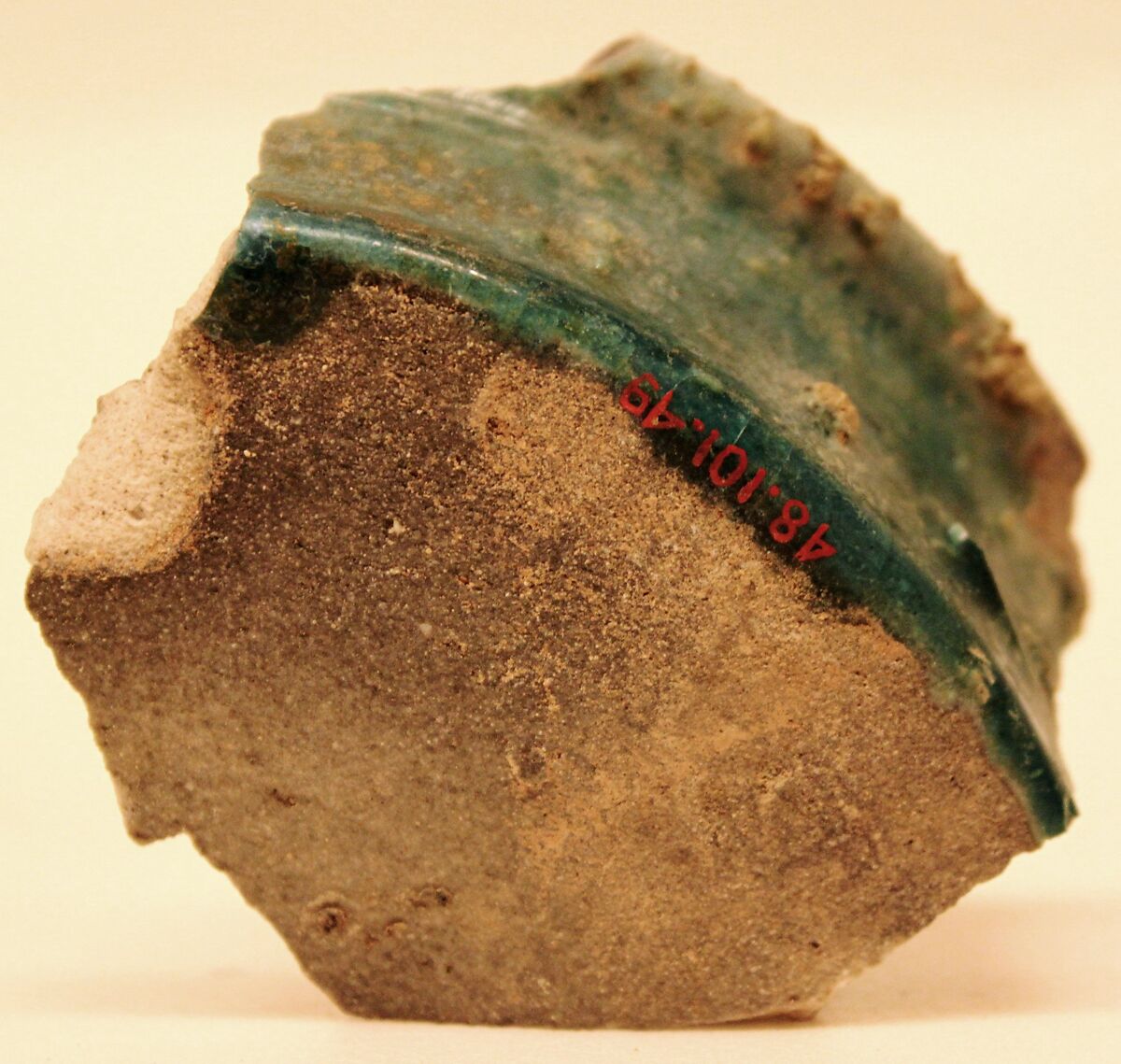 Fragment of a Waster, Stonepaste; buff body under transparent alkaline glaze