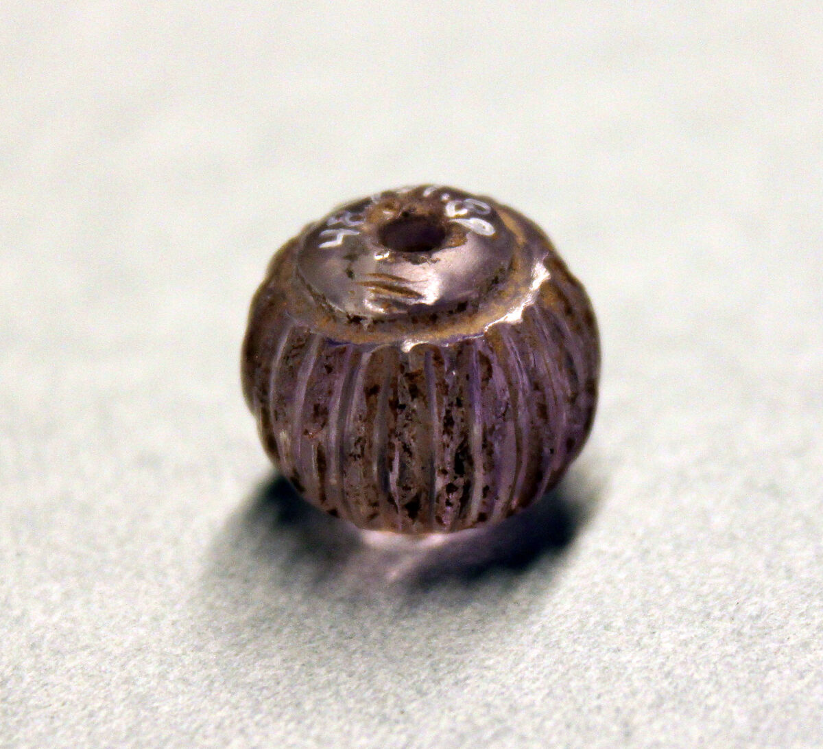 Bead, Amethyst; cut 