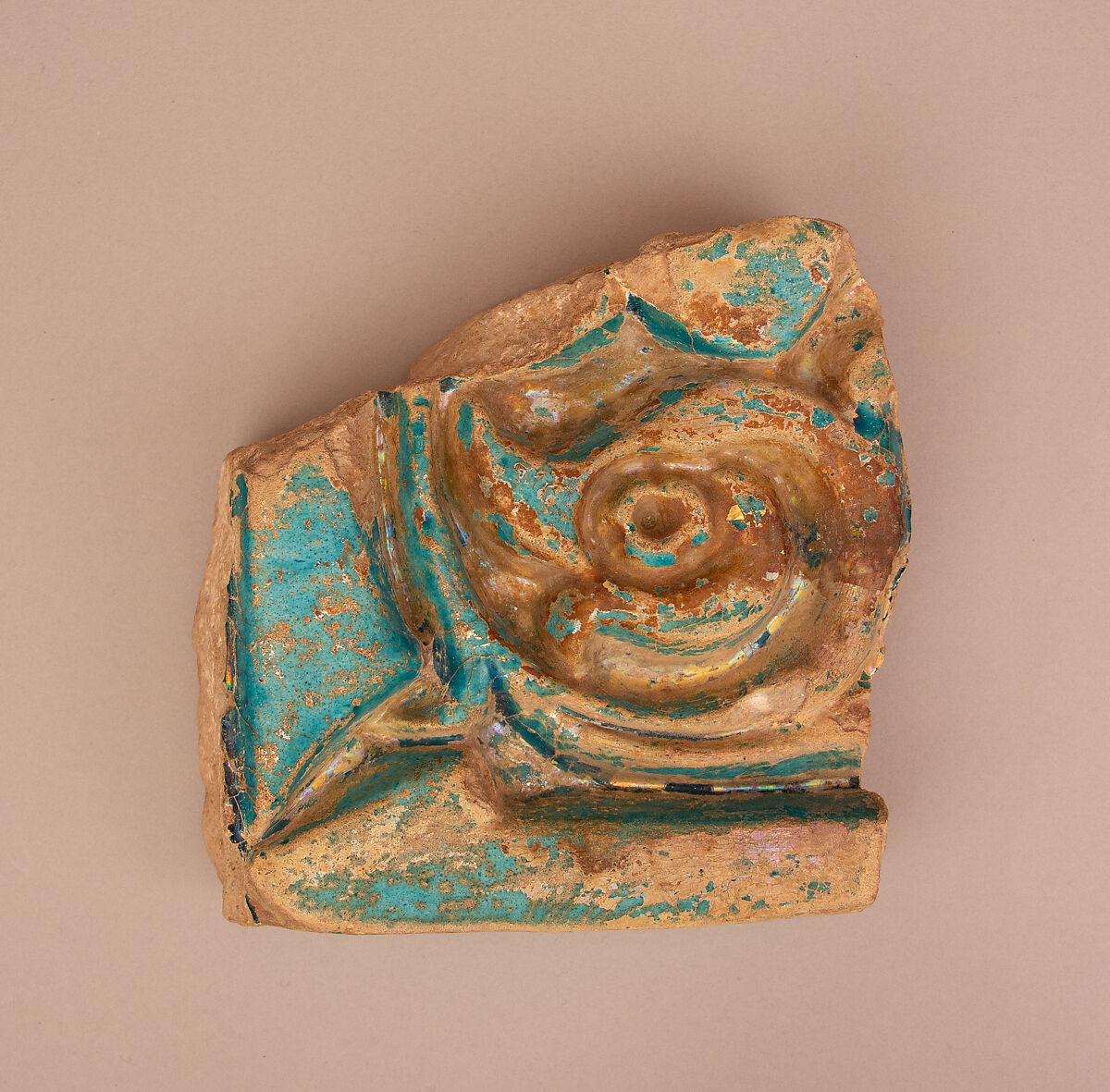 Fragment of a Carved or Molded and Glazed Tile, Earthenware; turquoise glaze 