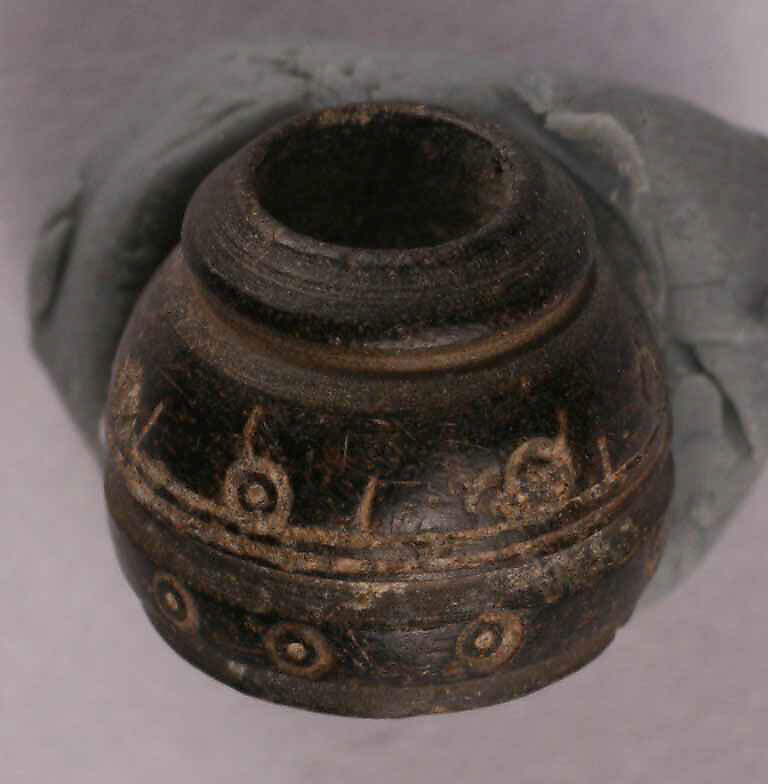 Spindle Whorl, Stone; carved and incised 