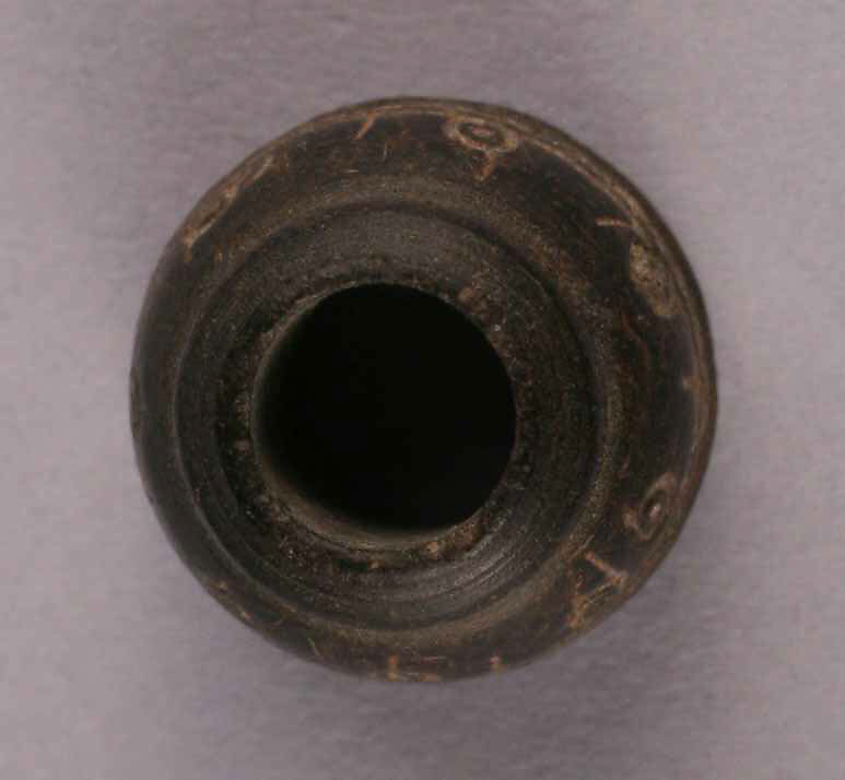 Spindle Whorl, Stone; carved and incised