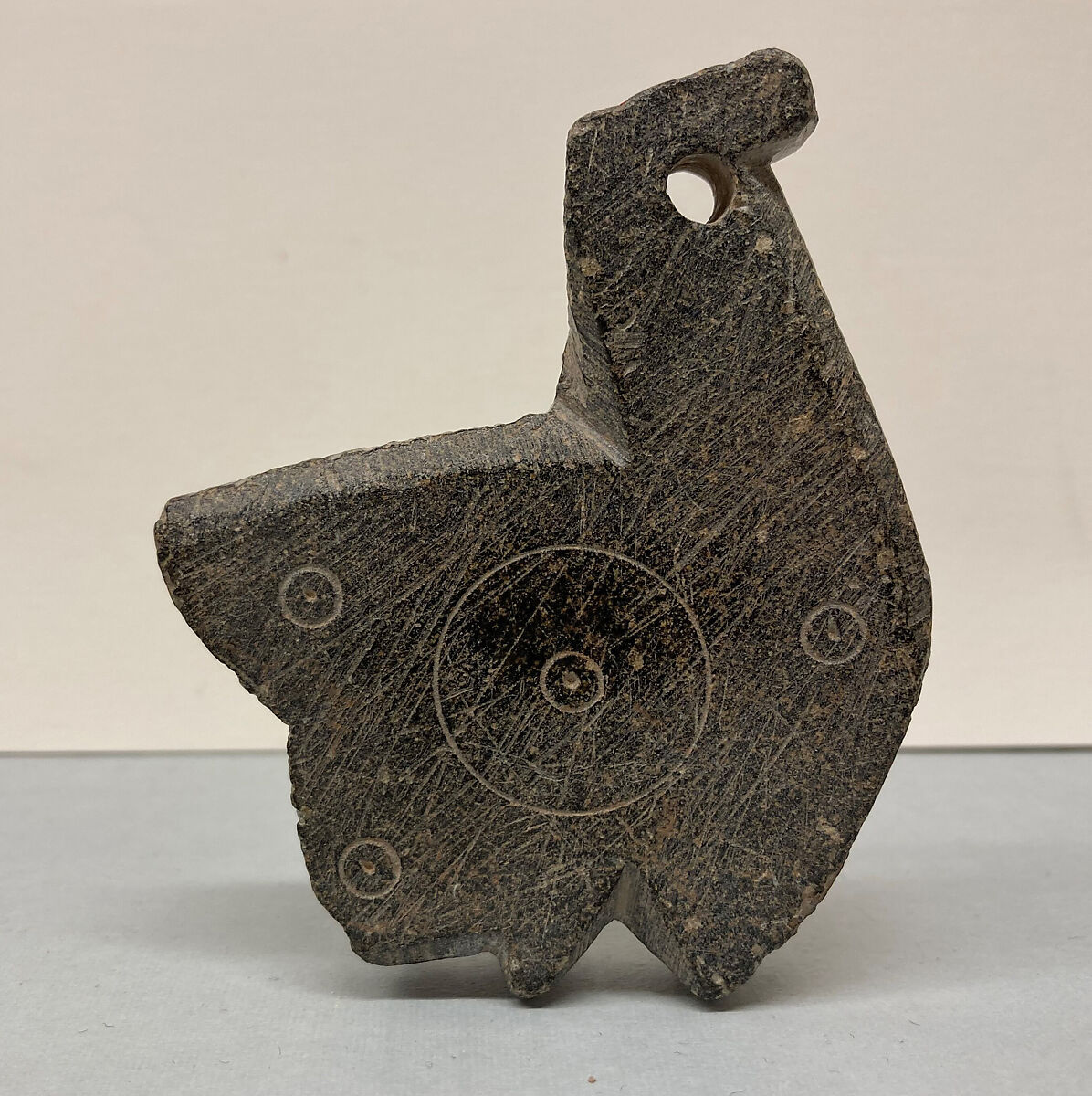 Fragment of a Cooking Spit, Stone; carved