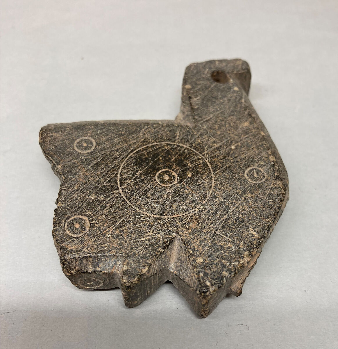 Fragment of a Cooking Spit, Stone; carved