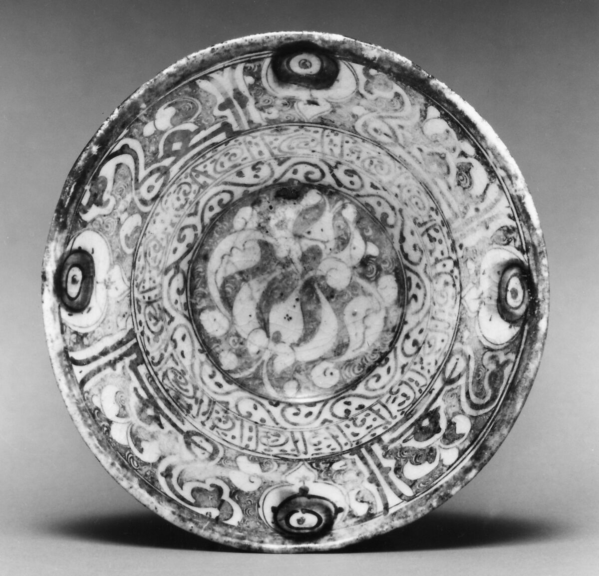 Bowl, Stonepaste; painted in luster and blue on opaque white glaze under transparent colorless glaze