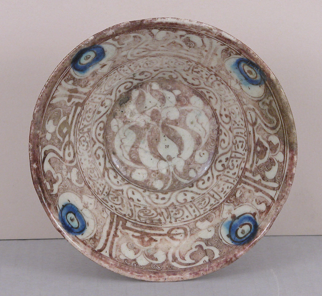 Bowl, Stonepaste; painted in luster and blue on opaque white glaze under transparent colorless glaze 