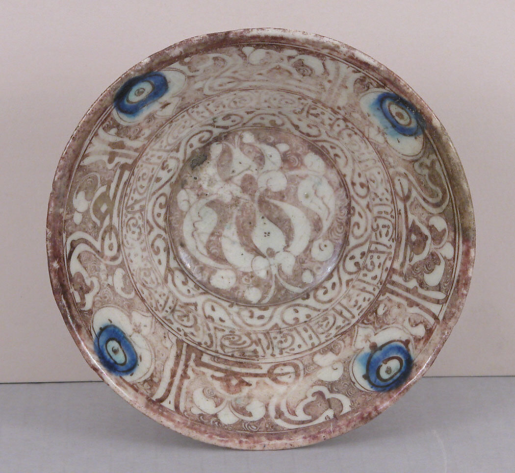 Bowl, Stonepaste; painted in luster and blue on opaque white glaze under transparent colorless glaze