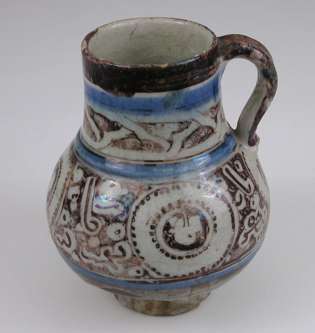 Ewer, Stonepaste; painted in luster and blue on opaque white glaze under transparent colorless glaze 