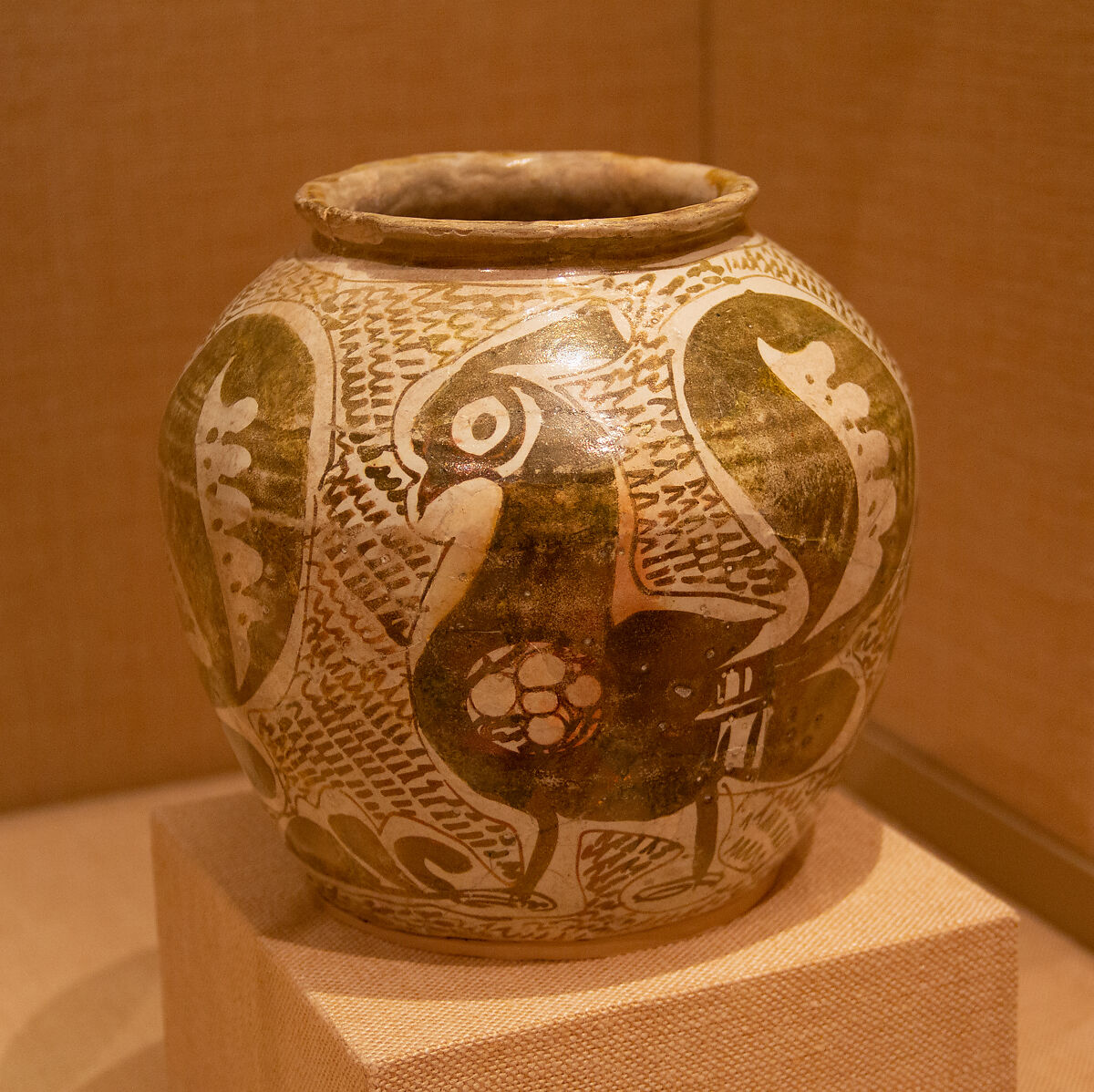 Jar Depicting Three Spirited Peacocks, Earthenware; luster-painted on opaque white glaze 