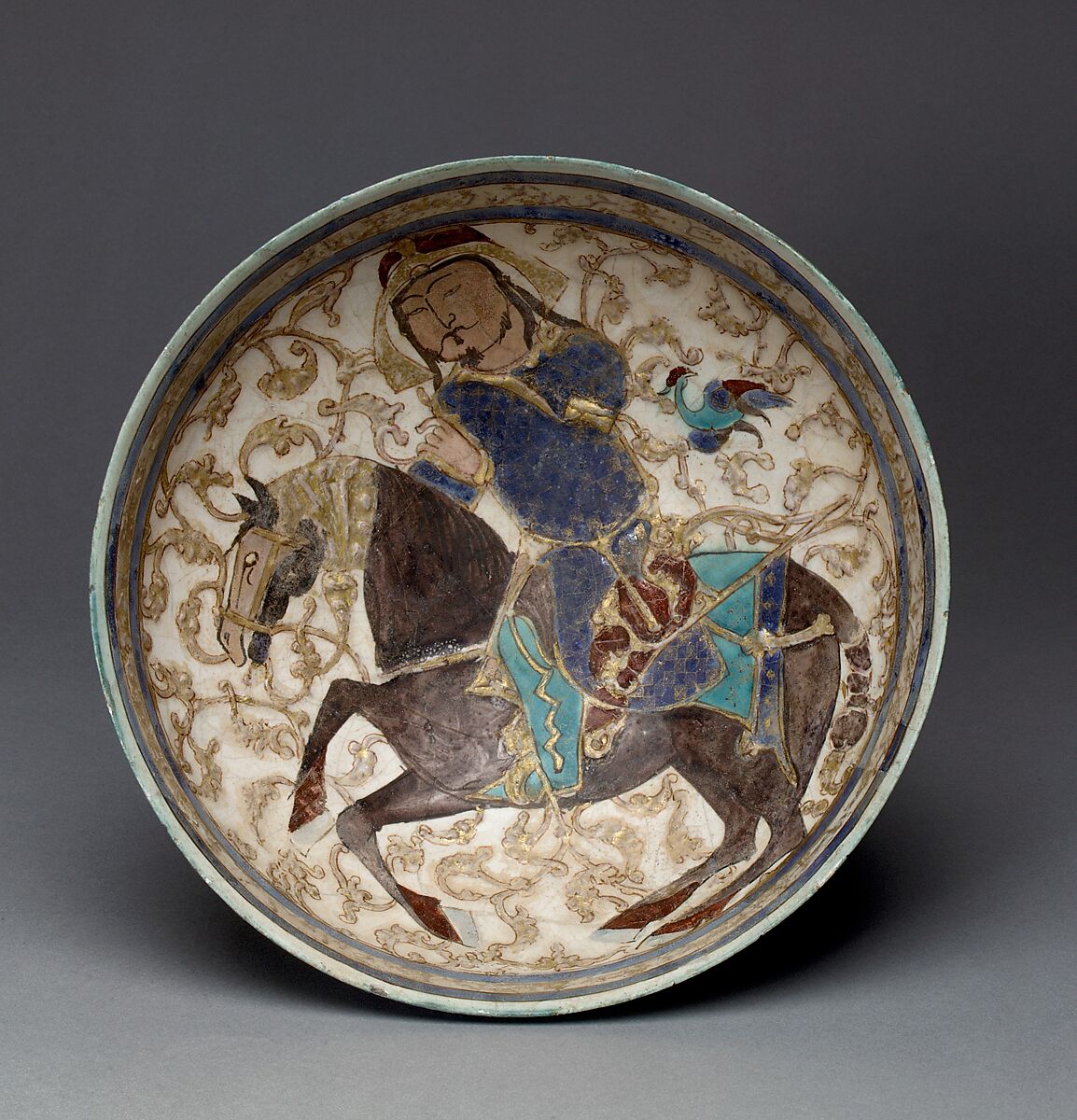 Bowl with Prince on Horseback, Stonepaste; applied decoration, polychrome inglaze and overglaze painted and gilded on opaque monochrome glaze (mina'i) 