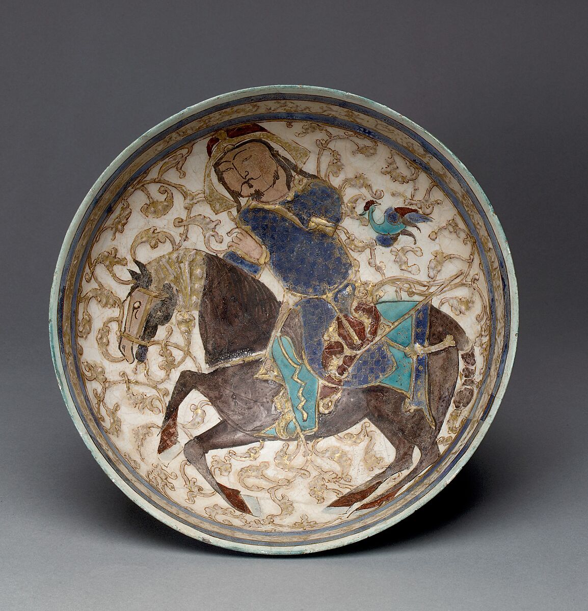 Bowl with Prince on Horseback, Stonepaste; applied decoration, polychrome inglaze and overglaze painted and gilded on opaque monochrome glaze (mina'i)
