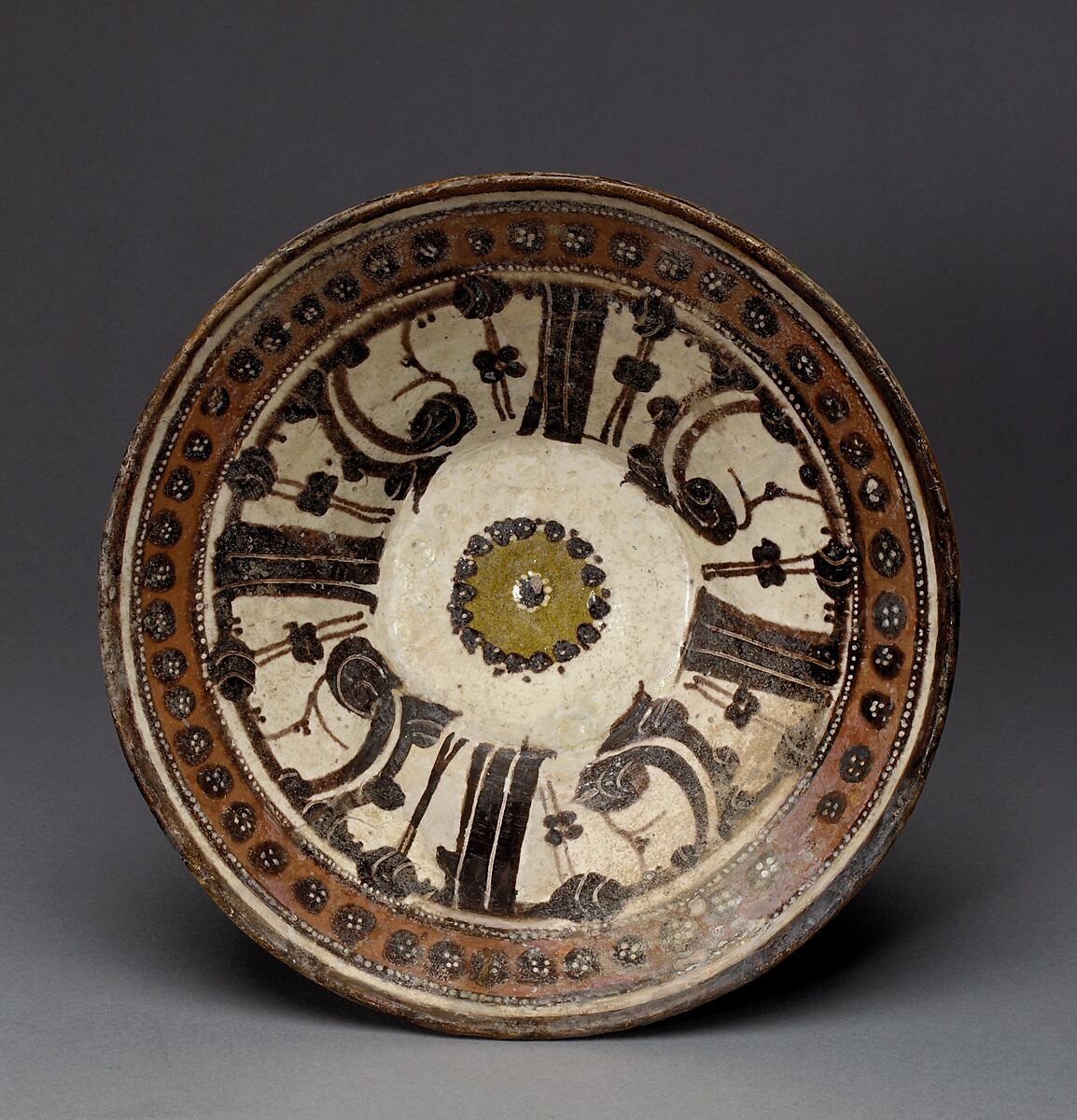 Bowl, Earthenware; white slip, polychrome slip decoration under transparent glaze 