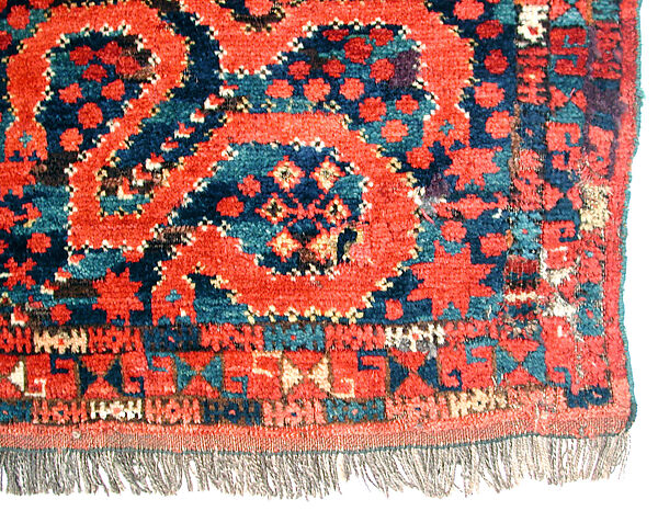 Carpet, Wool (warp, weft and pile); asymmetrically knotted pile