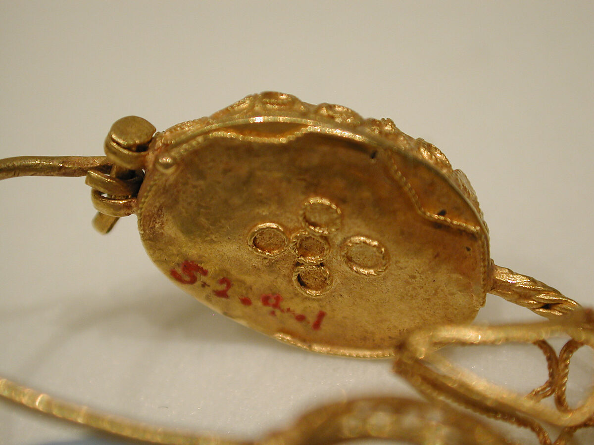 Earring, One of a Pair, Gold wire with filigree and pale stone