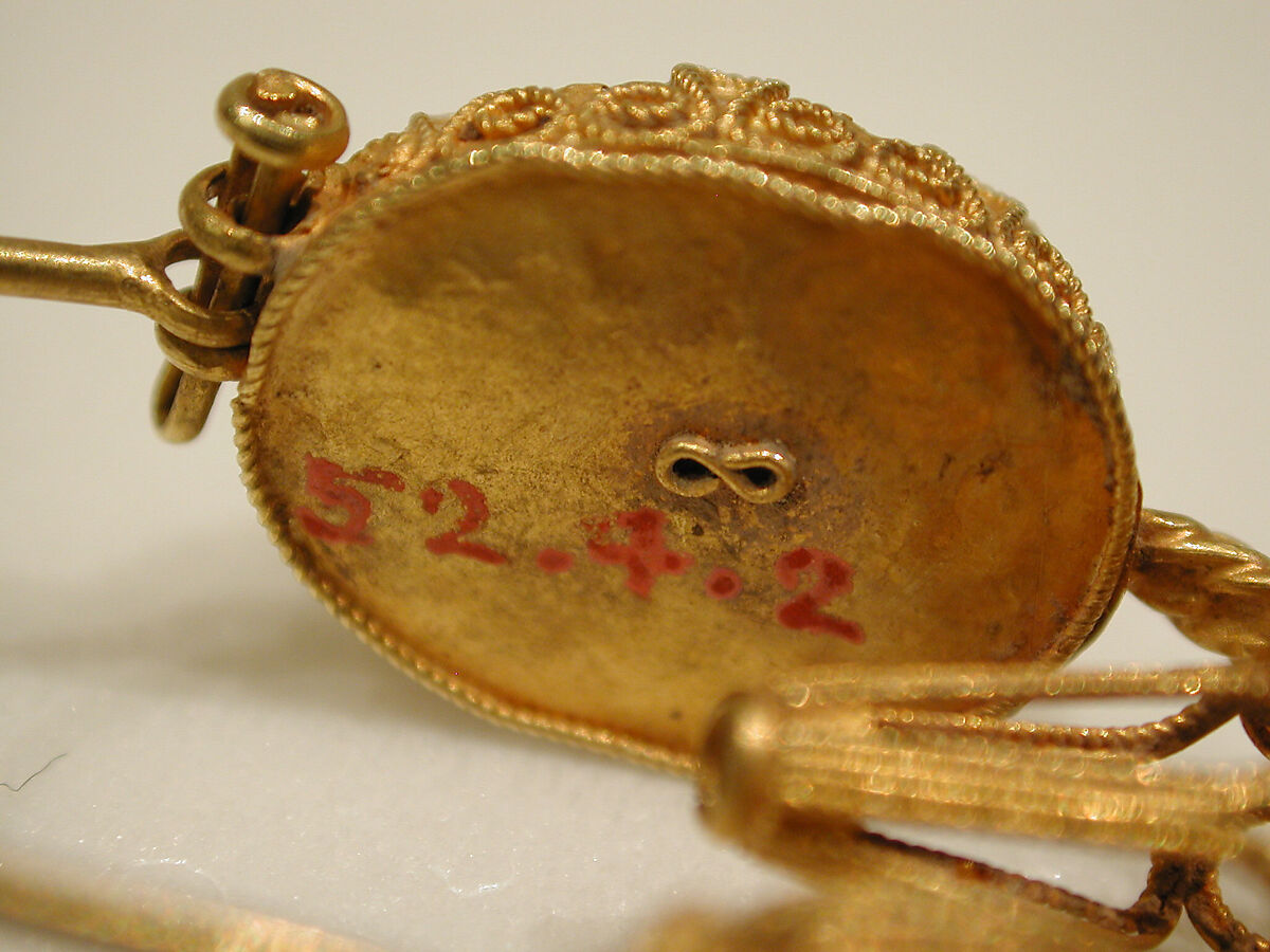 Earring, One of a Pair, Gold wire with filigree and pale stone