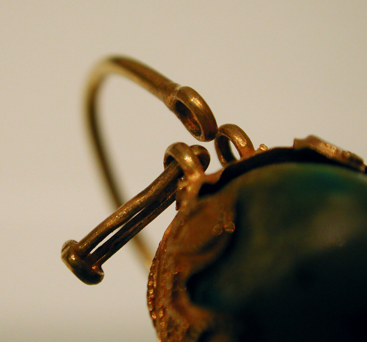 Earring, One of a Pair, Gold wire with filigree and pale stone