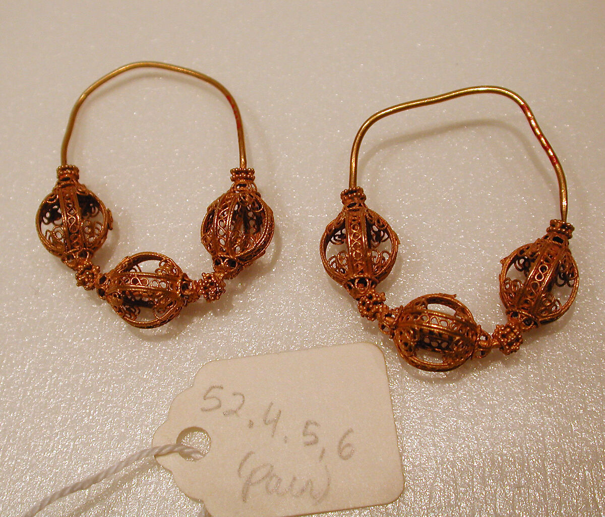 Earring, One of a Pair, Gold wire with filigree 