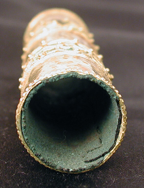 Hair Ornament, One of a Pair, Gold; cast, fabricated, engraved, with a copper alloy inner sleeve, decorated with twisted wire and granulation