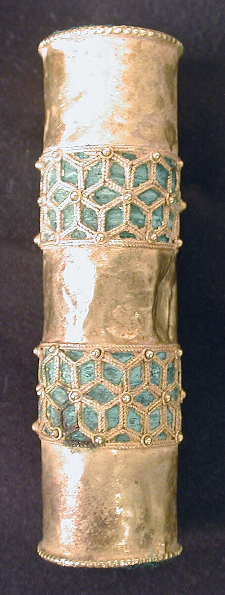 Hair Ornament, One of a Pair, Gold; cast, fabricated, engraved, with a copper alloy inner sleeve, decorated with twisted wire and granulation