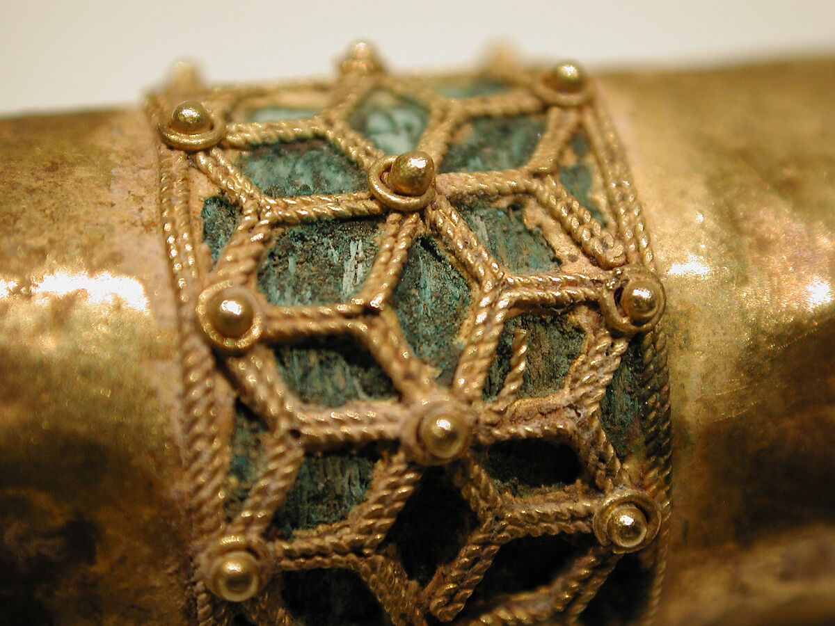 Hair Ornament, One of a Pair, Gold; cast, fabricated, engraved, with a copper alloy inner sleeve, decorated with twisted wire and granulation