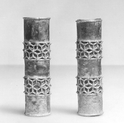 Hair Ornament, One of a Pair, Gold; cast, fabricated, engraved, with a copper alloy inner sleeve, decorated with twisted wire and granulation