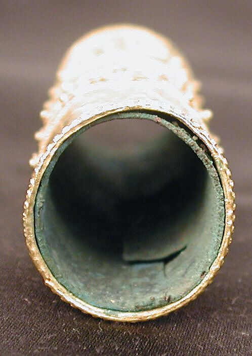 Hair Ornament, One of a Pair, Gold; cast, fabricated, engraved, with a copper alloy inner sleeve, decorated with twisted wire and granulation