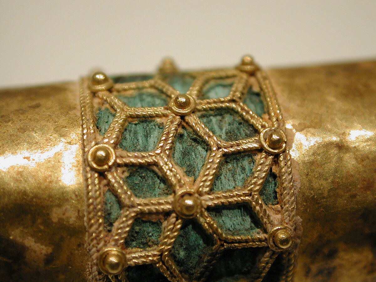 Hair Ornament, One of a Pair, Gold; cast, fabricated, engraved, with a copper alloy inner sleeve, decorated with twisted wire and granulation