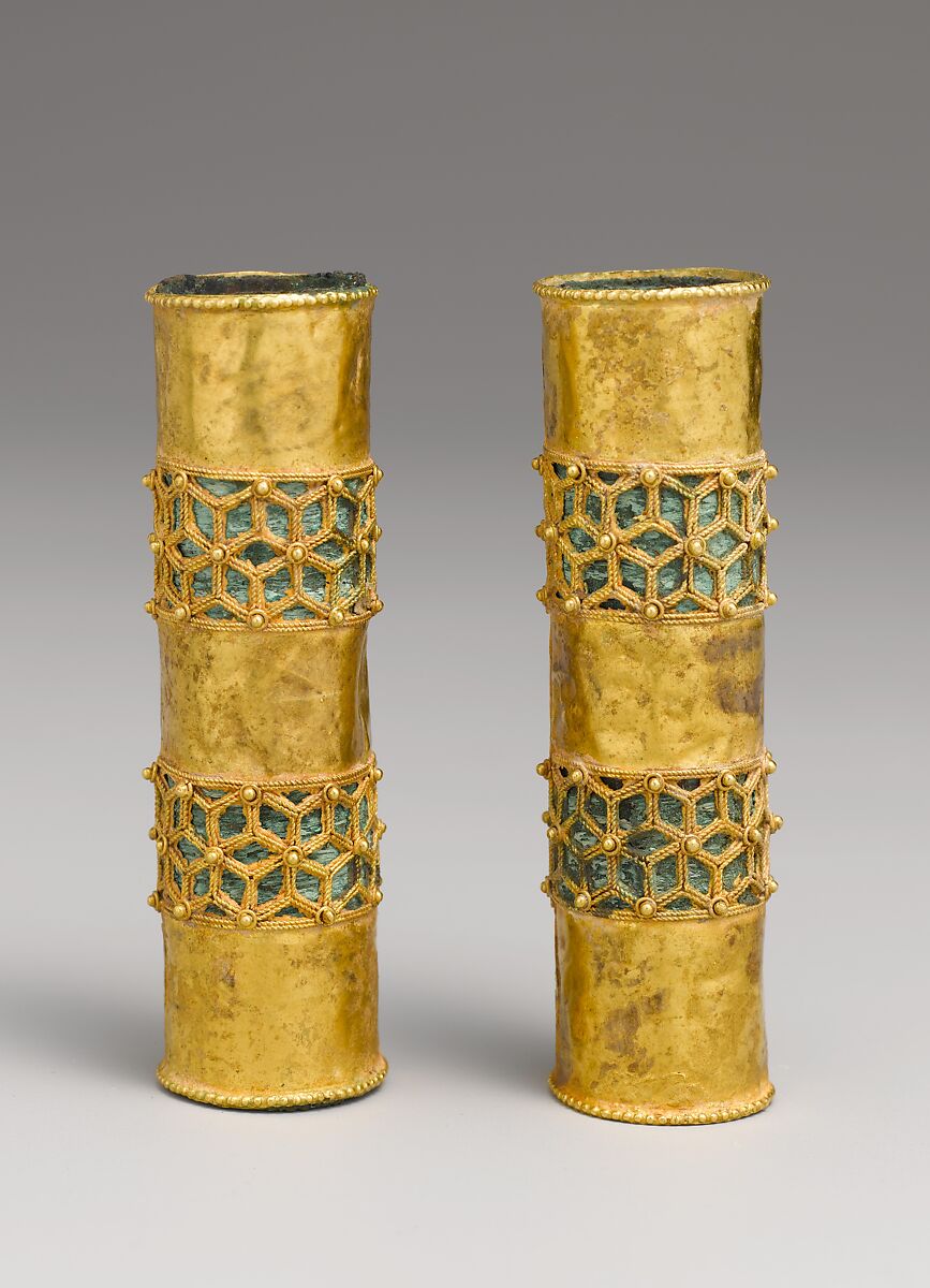 Hair Ornament, One of a Pair, Gold; cast, fabricated, engraved, with a copper alloy inner sleeve, decorated with twisted wire and granulation 