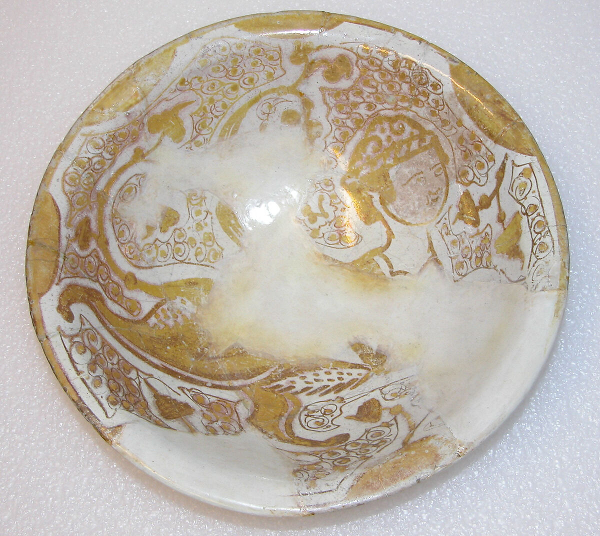 Bowl, Earthenware; luster-painted on opaque white glaze under transparent colorless glaze 