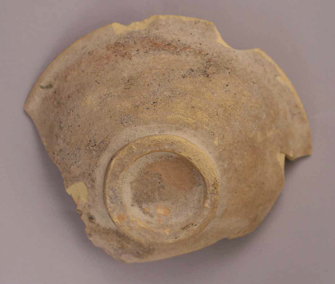 Fragment of a Bowl, Earthenware; white slip with glazed decoration