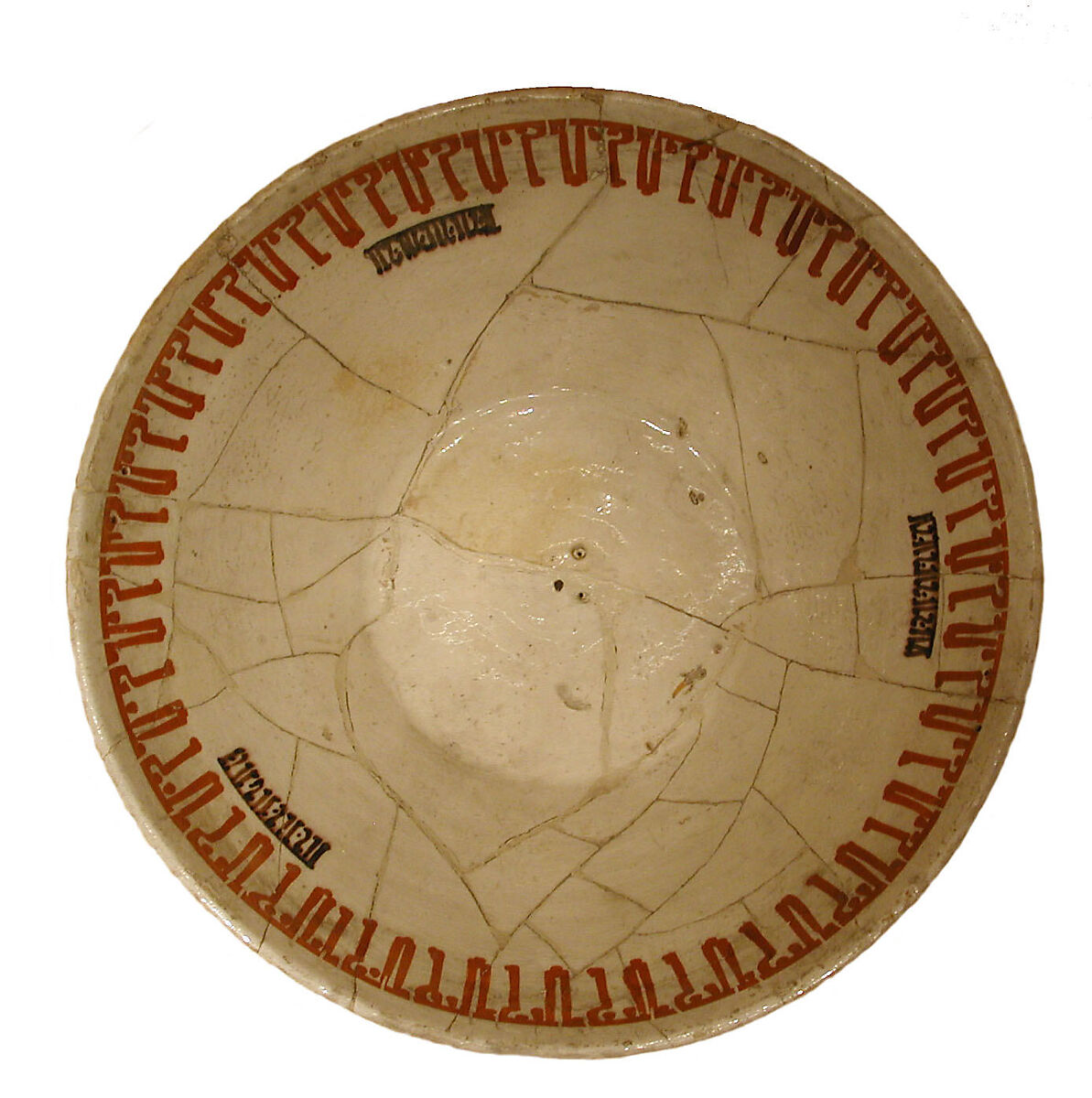 Bowl with Pseudo-inscriptional Design, Earthenware; white slip with polychrome slip decoration under transparent glaze 