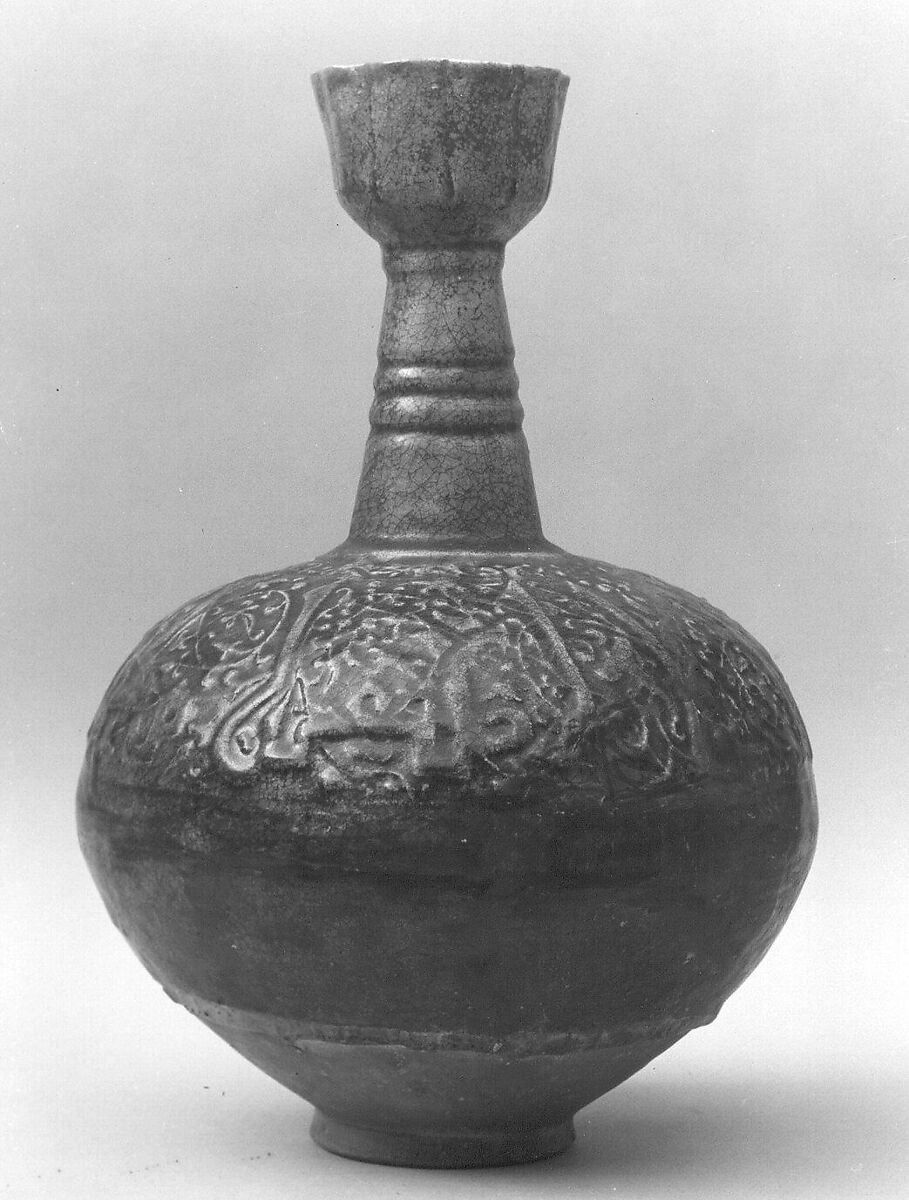 Bottle, Thrown and molded in relief; earthenware