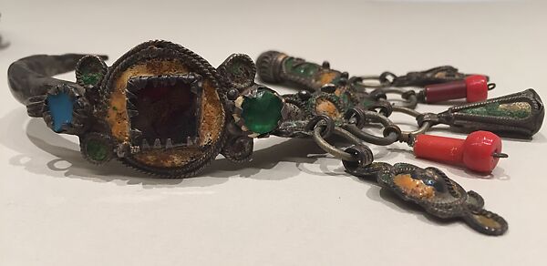 Ear Ornament (Tikhrazin), One of a Pair, Silver, green and yellow enamel, colored glass, and plastic