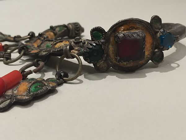 Ear Ornament (Tikhrazin), One of a Pair, Silver, green and yellow enamel, colored glass, and plastic
