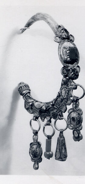 Ear Ornament (Tikhrazin), One of a Pair, Silver, green and yellow enamel, colored glass, and plastic