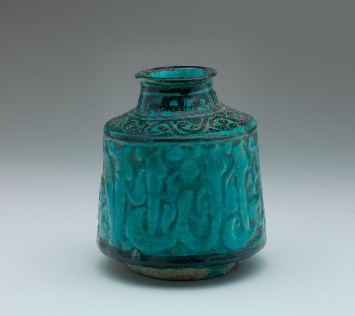 Jar with Carved Benedictory Arabic Inscription in Thuluth Script, Stonepaste; carved and painted under transparent glaze 