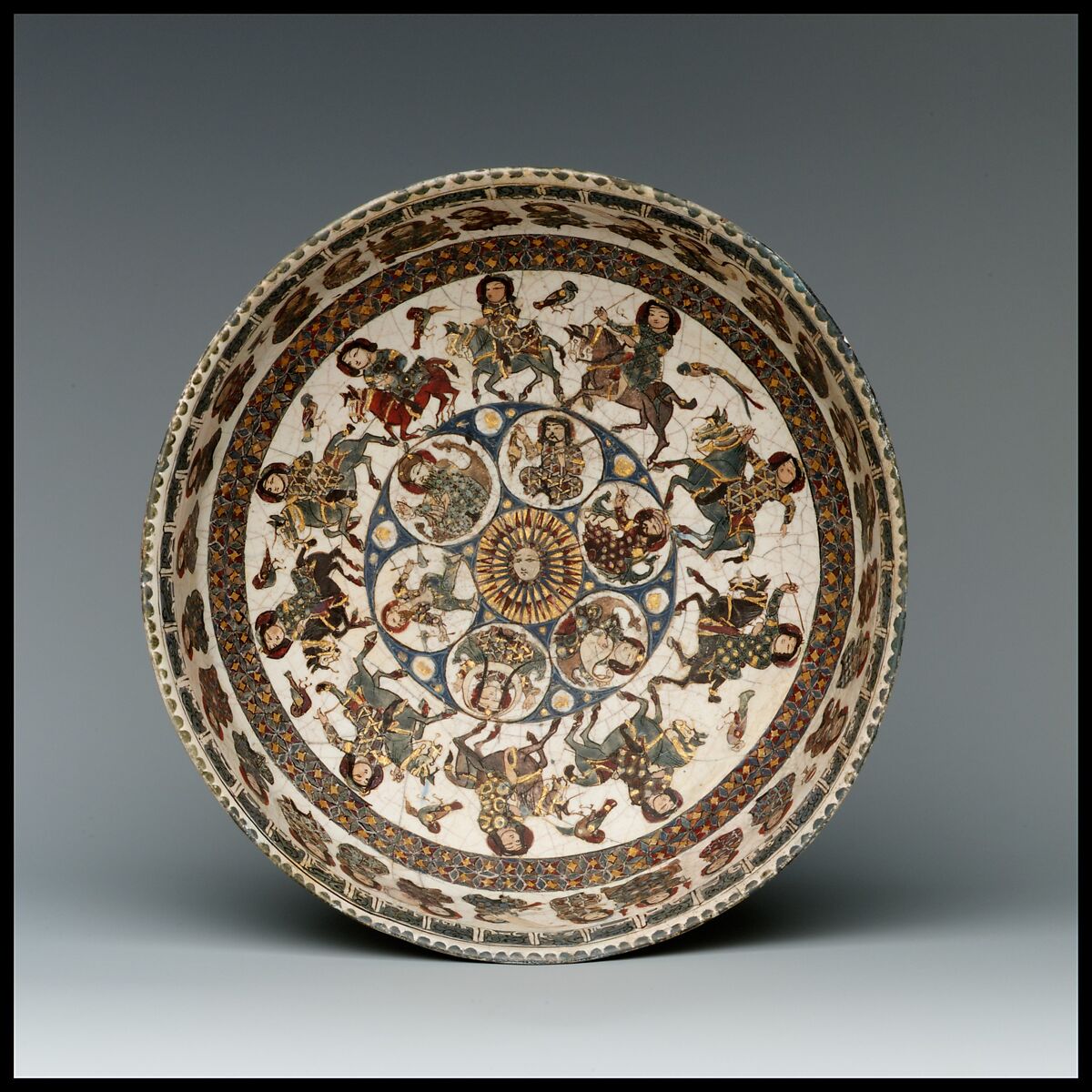 Bowl with Courtly and Astrological Motifs, Stonepaste; polychrome inglaze and overglaze painted and gilded on opaque monochrome glaze (mina'i)