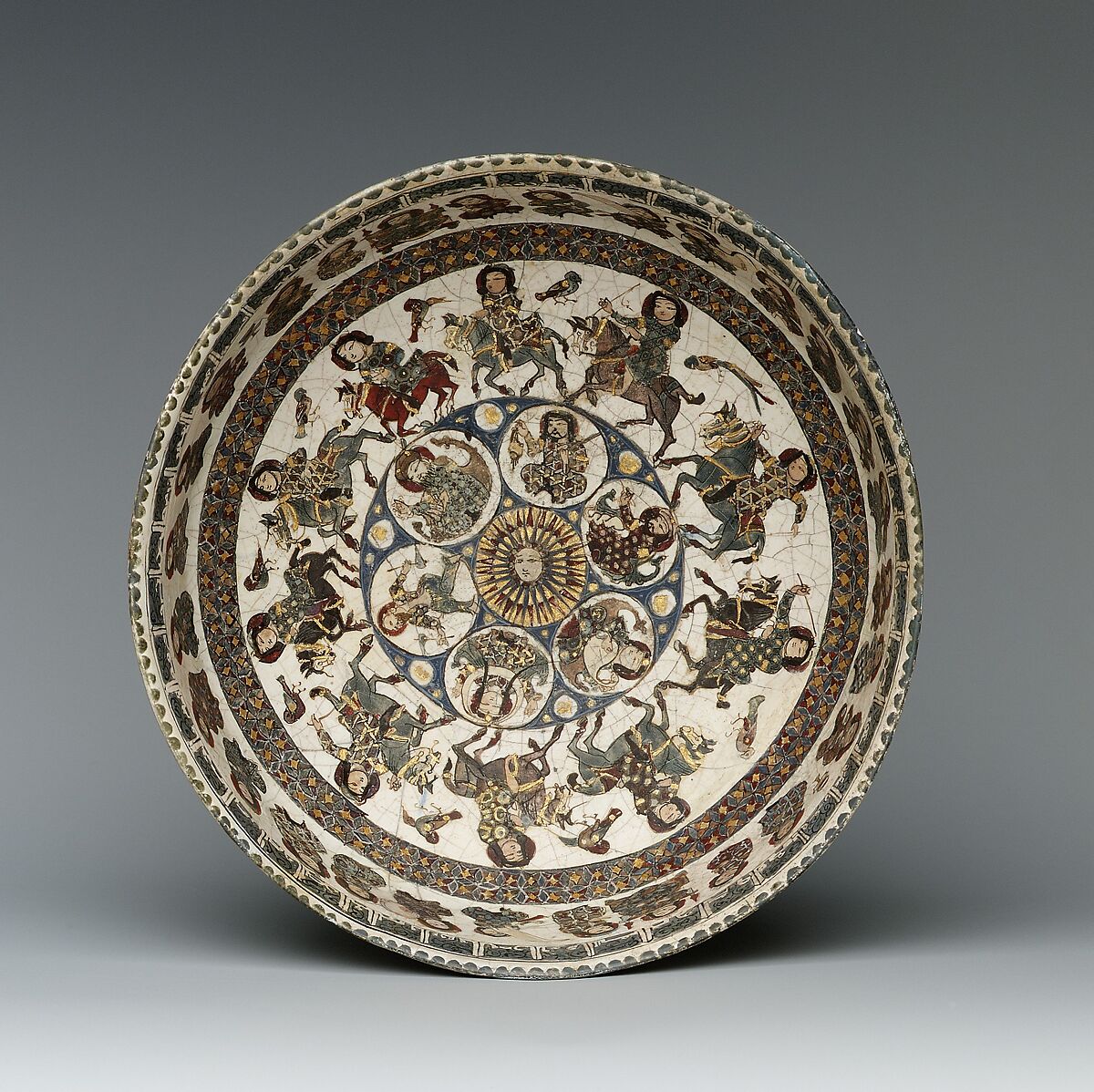 Bowl with Courtly and Astrological Motifs, Stonepaste; polychrome inglaze and overglaze painted and gilded on opaque monochrome glaze (mina'i)