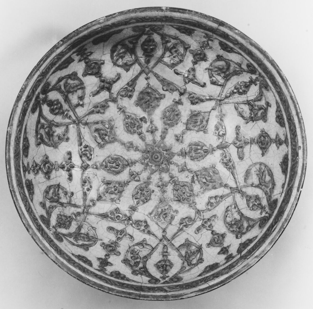 Bowl, Stonepaste; applied decoration, overglaze painted and gilded on an opaque monochrome glaze (mina'i)