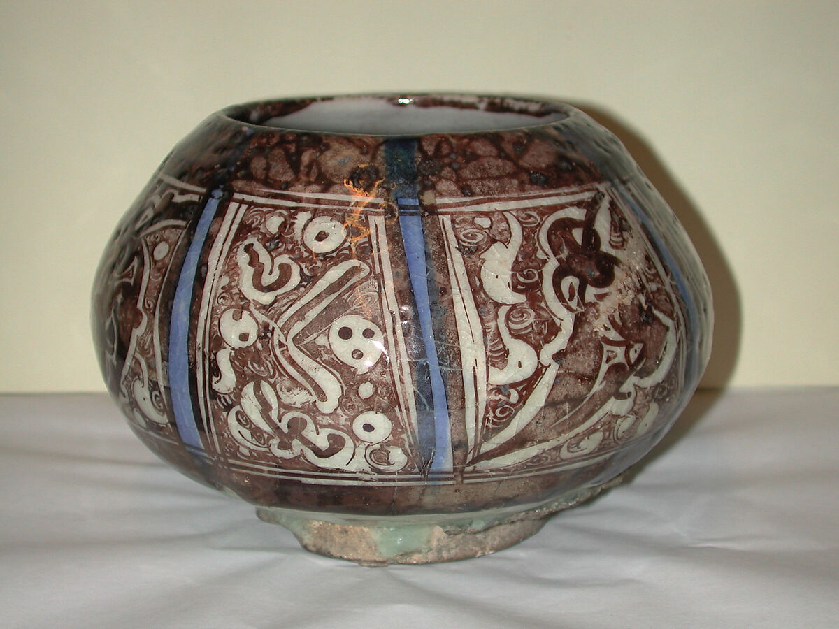 Bowl, Stonepaste; painted in luster and blue on opaque white glaze under transparent colorless glaze