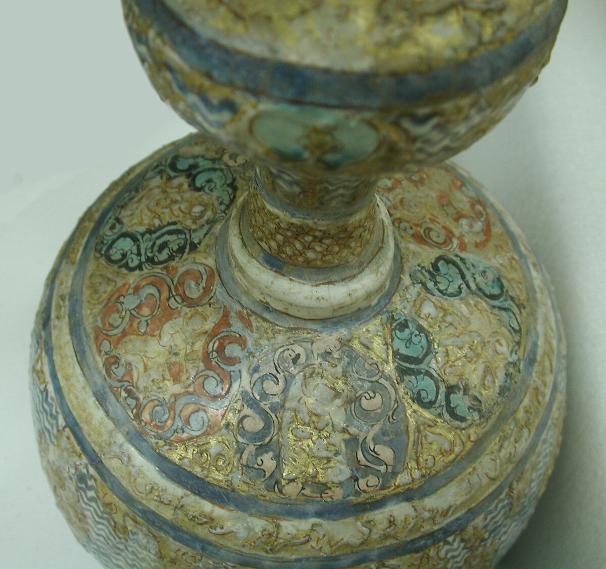 Gilded Mina'i Ceramic, Stonepaste; applied decoration, polychrome inglaze and overglaze painted and gilded on opaque monochrome glaze (mina'i)