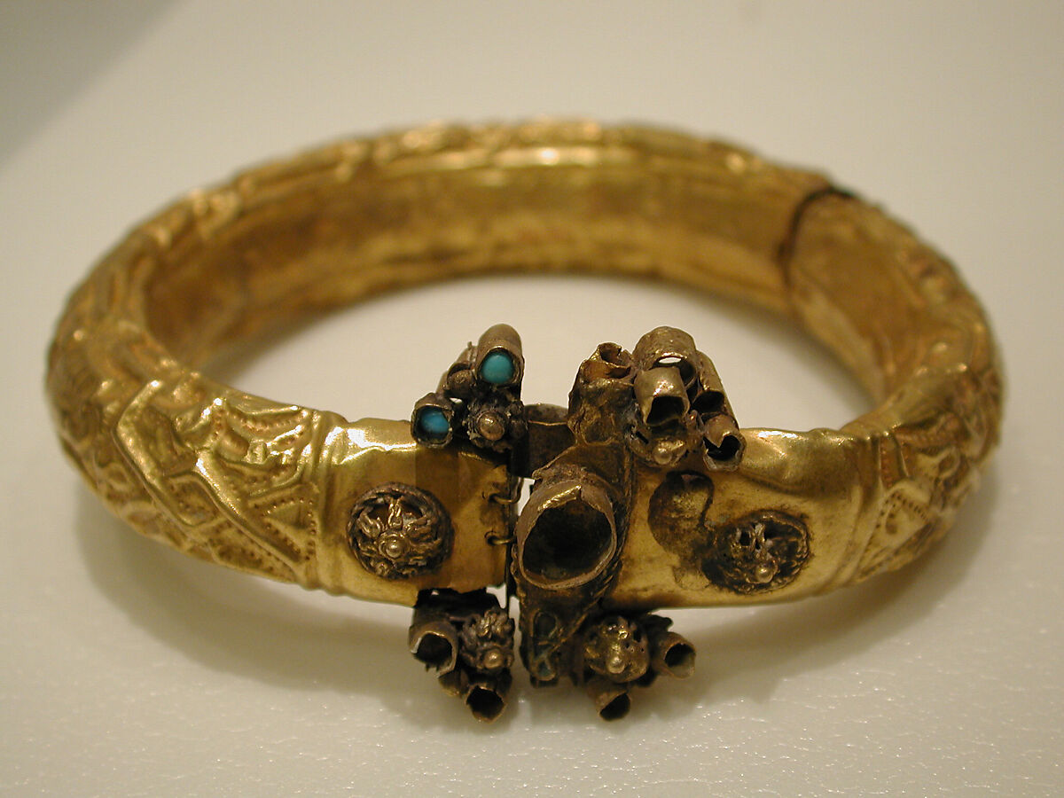 Bracelet, Gold fabricated from sheet, with repoussé decoration, punching, twisted wire, and granulation 