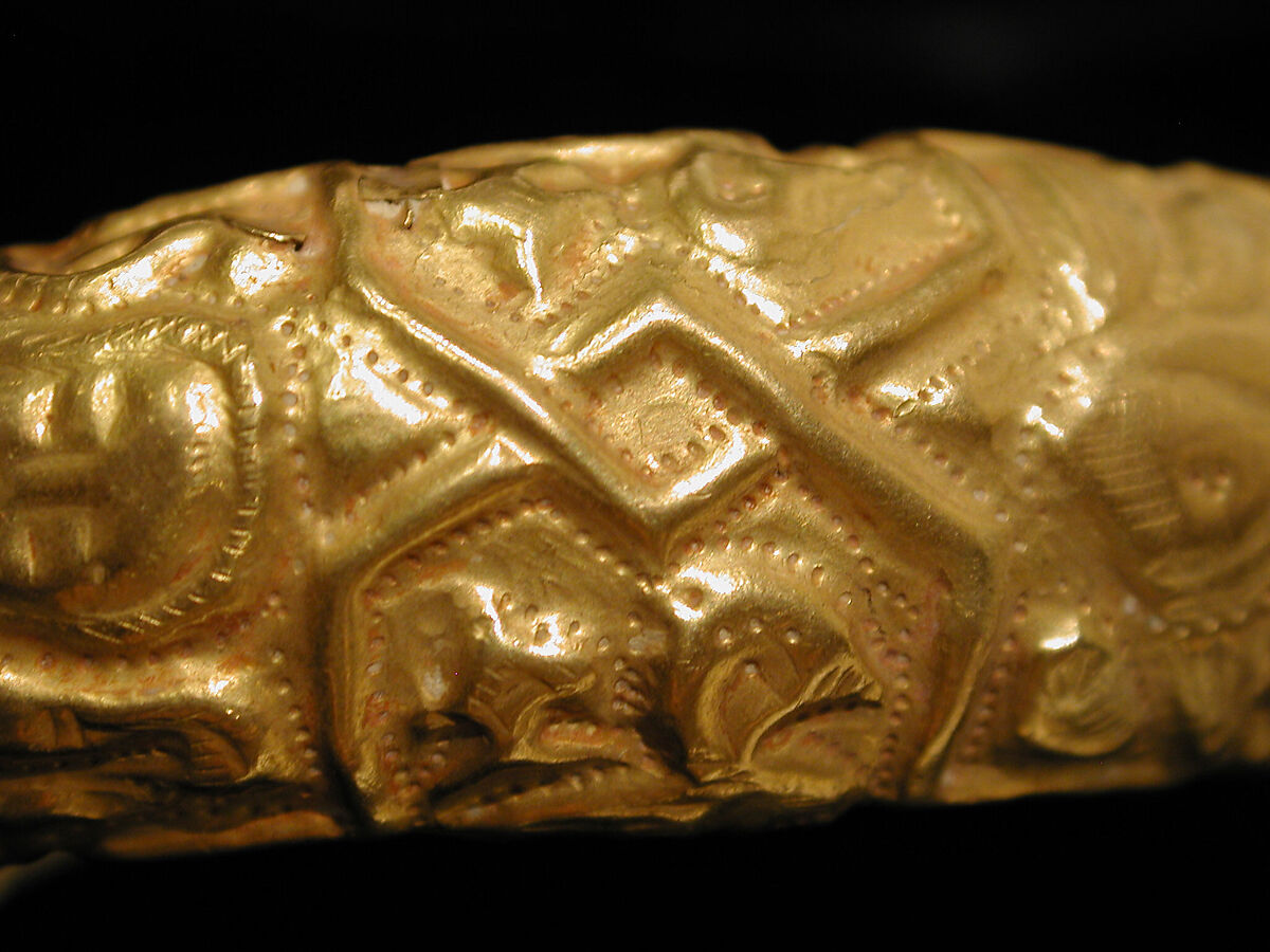 Bracelet, Gold fabricated from sheet, with repoussé decoration, punching, twisted wire, and granulation