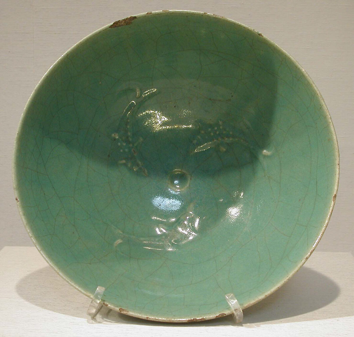 Bowl with Fish Motifs, Stonepaste; molded and glazed
