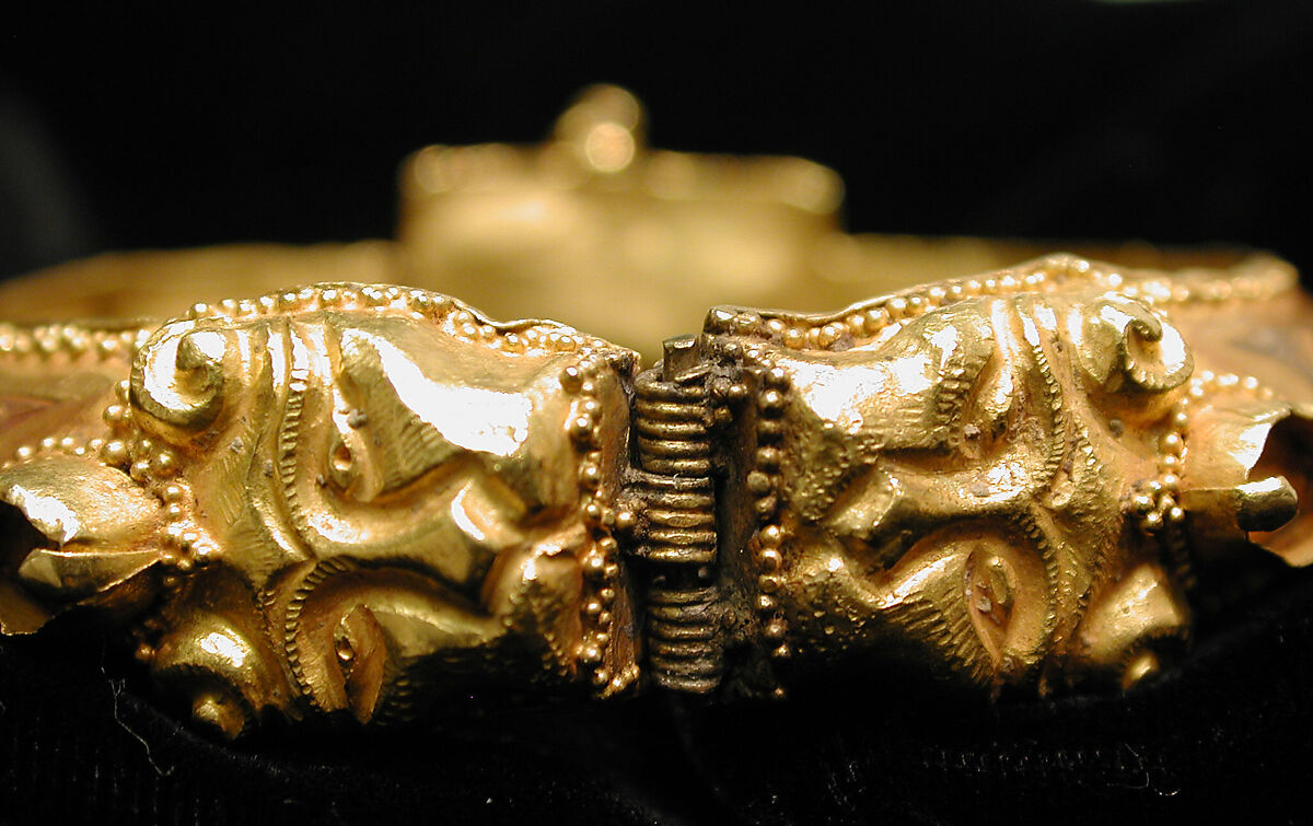 Bracelet, Gold, fabricated from sheet, decorated with bitumen-highlighted incising, granulation, and repoussé, set with glazed quartz, ruby, garnet, and, originally, two other stones