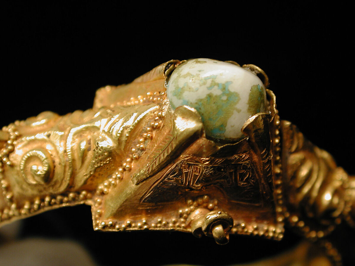 Bracelet, Gold, fabricated from sheet, decorated with bitumen-highlighted incising, granulation, and repoussé, set with glazed quartz, ruby, garnet, and, originally, two other stones